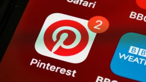Pinterest app icon with a notification badge on a smartphone home screen